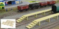 Contains OO Scale pre-coloured plastic kit with full instructions. These pre-coloured concrete platforms were seen in many locations and used by staff to clean the insides of coaching stock. Supplied as a pair or joined to make one long platform. Built-up