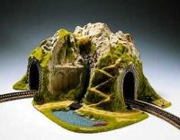 Curved Tunnel, Single Track, 41 x 37 cm, 22 cm Height Tunnels made of high quality strong plastic. Natural colors and rich decoration with careful detailing such as trees, bushes, banks, little houses, ponds, brooklets and fences